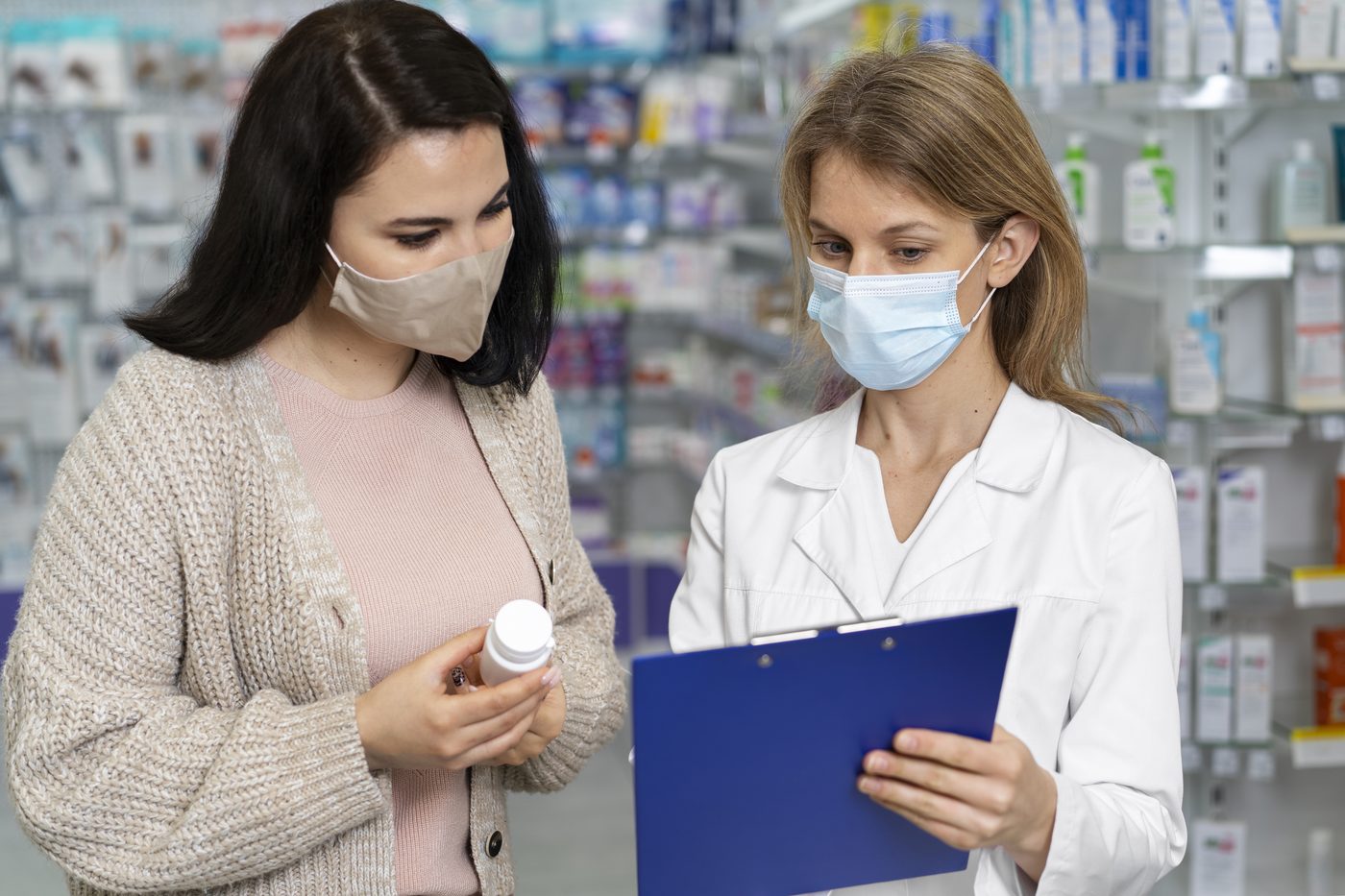 An integrative pharmacist reviewing medications with a patient