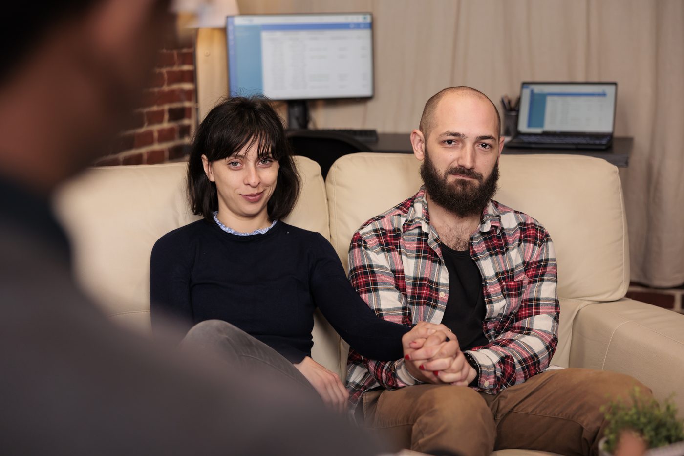 A patient and clinician talking through options in a consultation